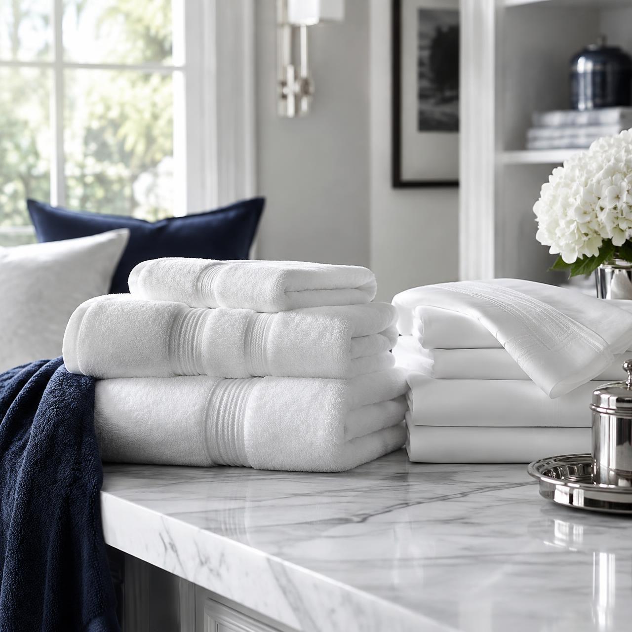 Freshly folded white towels and linen